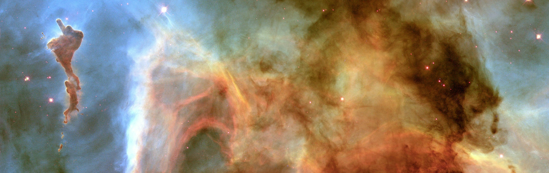 Imagem da NASA mostrando diversos pontos luminosos e formações de nebulosa